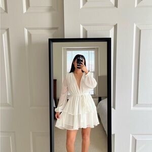 Long sleeve plunged white dress